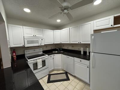 335 Knotty Pine Circle, Greenacres, FL 33463