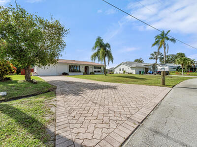 1075 SE Coral Reef Street, Port Saint Lucie, FL 34983