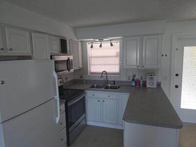 1871 Palm Acres Drive N, Palm Springs, FL 33406