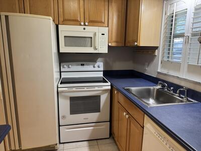 9911 Sandalfoot Boulevard, Boca Raton, FL 33428