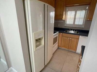 9911 Sandalfoot Boulevard, Boca Raton, FL 33428