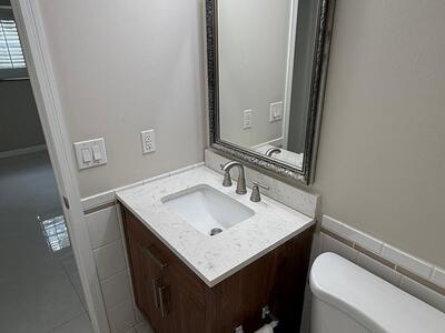 9911 Sandalfoot Boulevard, Boca Raton, FL 33428