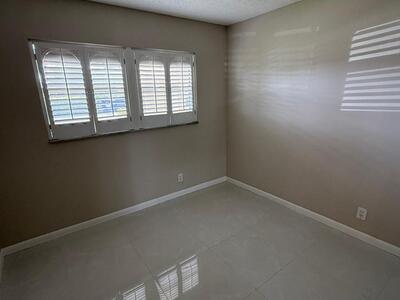 9911 Sandalfoot Boulevard, Boca Raton, FL 33428