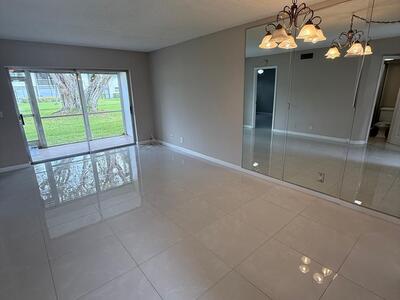 9911 Sandalfoot Boulevard, Boca Raton, FL 33428