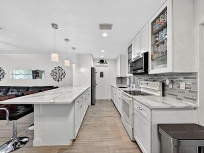 407 Highwood Circle, Jupiter, FL 33458