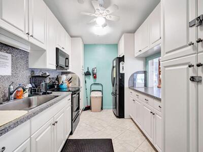 5900 Whispering Pine Way, Greenacres, FL 33463