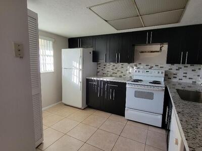 104 Palm Beach Trace Drive, Royal Palm Beach, FL 33411