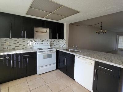 104 Palm Beach Trace Drive, Royal Palm Beach, FL 33411