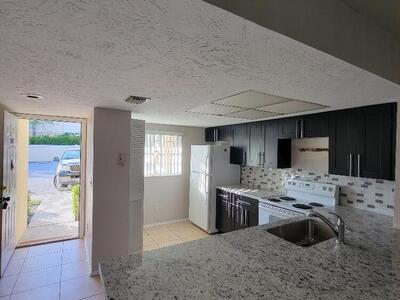 104 Palm Beach Trace Drive, Royal Palm Beach, FL 33411