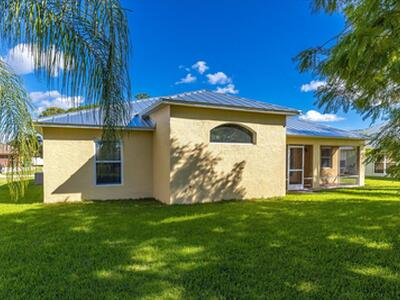 6020 NW Wolverine Road, Port Saint Lucie, FL 34986