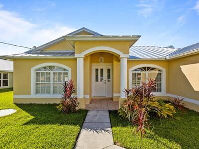 6020 NW Wolverine Road, Port Saint Lucie, FL 34986