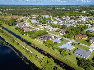 6020 NW Wolverine Road, Port Saint Lucie, FL 34986