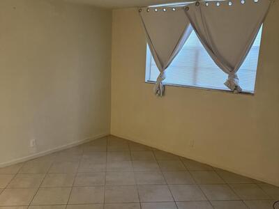 9949 Sandalfoot Boulevard, Boca Raton, FL 33428