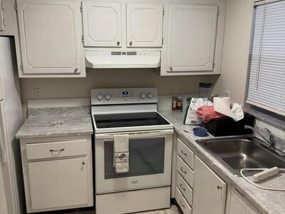 9949 Sandalfoot Boulevard, Boca Raton, FL 33428