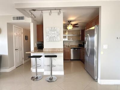 401 Golden Isles Drive, Hallandale Beach, FL 33009