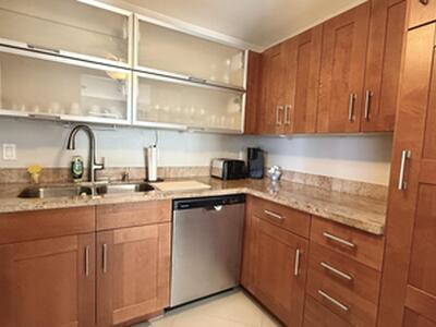 401 Golden Isles Drive, Hallandale Beach, FL 33009