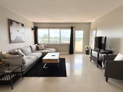 401 Golden Isles Drive, Hallandale Beach, FL 33009