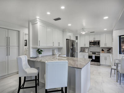 6 Lexington Lane E, Palm Beach Gardens, FL 33418