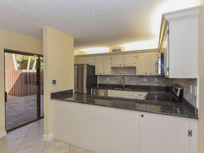 11 Atrium Circle, Atlantis, FL 33462