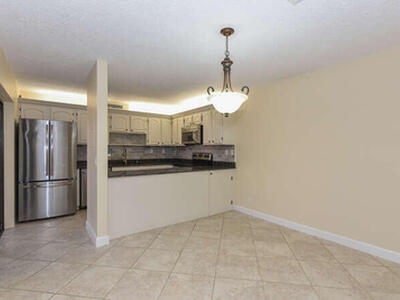 11 Atrium Circle, Atlantis, FL 33462