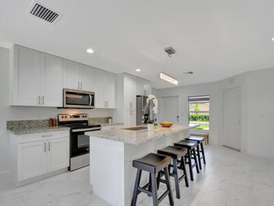 3871 Patio Court, Palm Springs, FL 33461