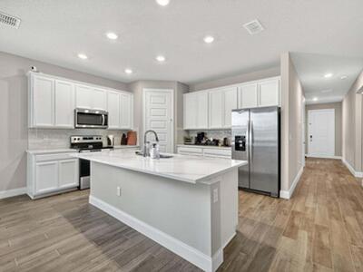 6544 NW Cloverdale Avenue, Port Saint Lucie, FL 34987