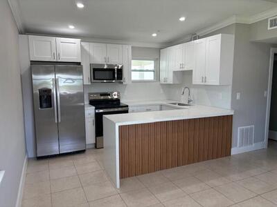 5580 Honeysuckle Drive, West Palm Beach, FL 33415